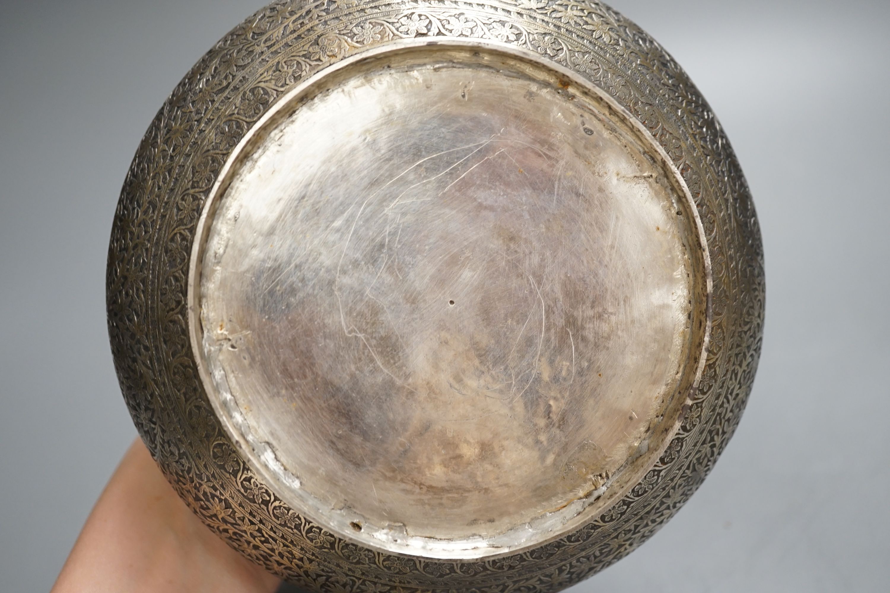 A 19th century North Indian silver surahi with engraved shawl decoration 30cm